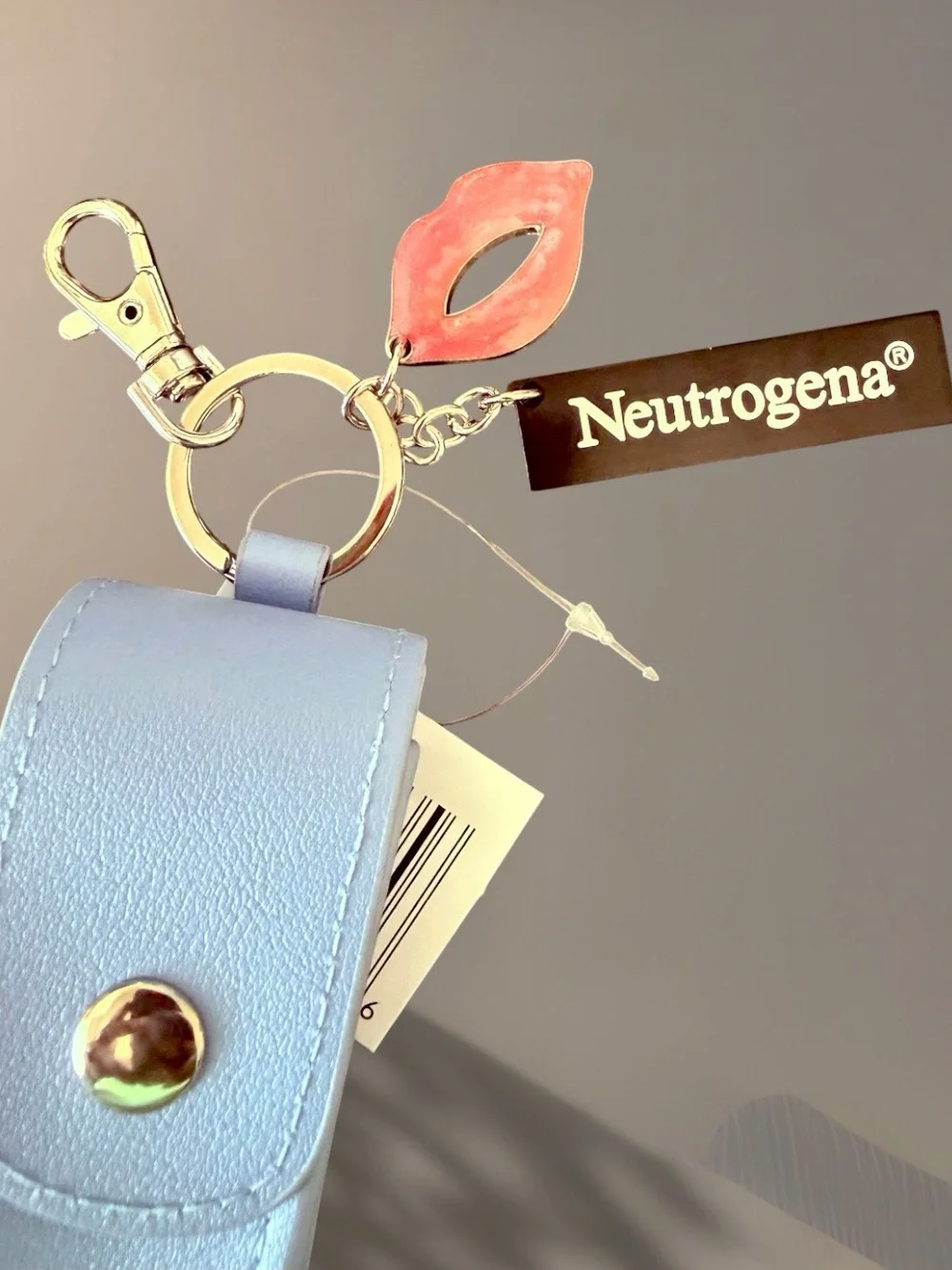 Neutrogena Blue Lipstick Lipbalm Holder Keychain NWT